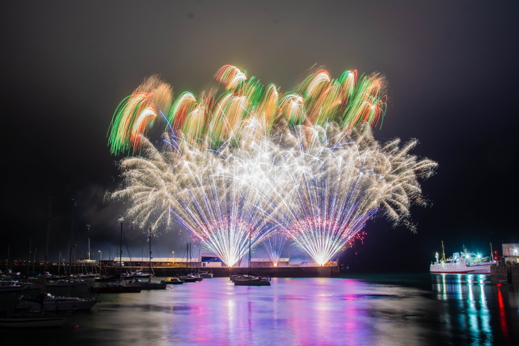 Golowan Festival fireworks lighting up the Penzance harbour on Mazey Eve, photographed by Greg Huckfield
